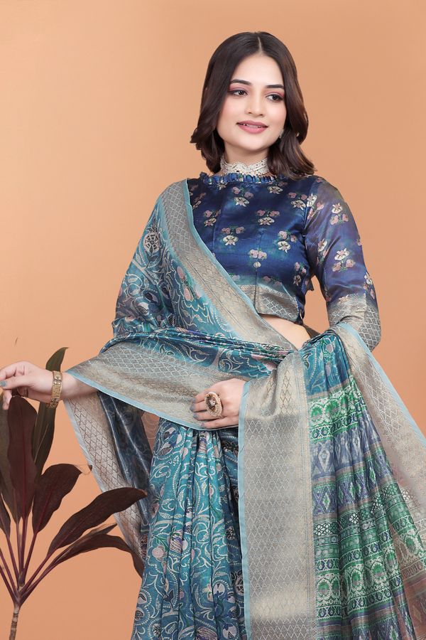 Teal Blue Floral Cotton Saree with Woven Border and Tassels