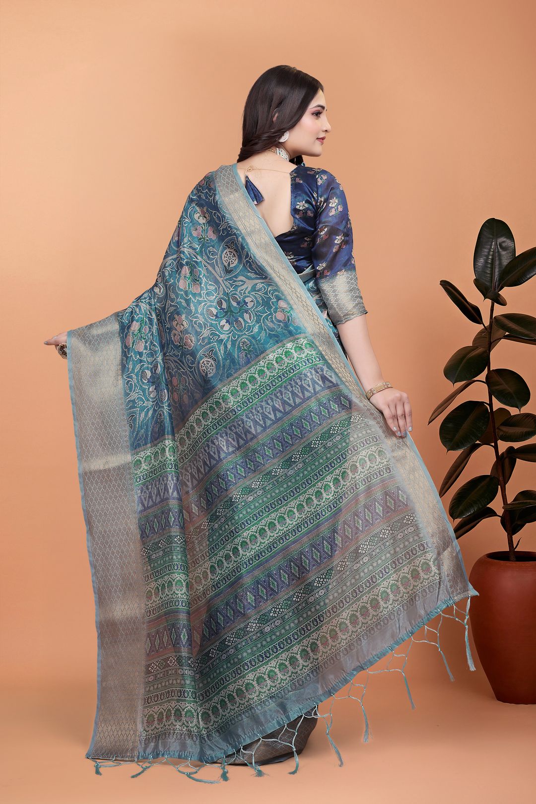 Teal Blue Floral Cotton Saree with Woven Border and Tassels