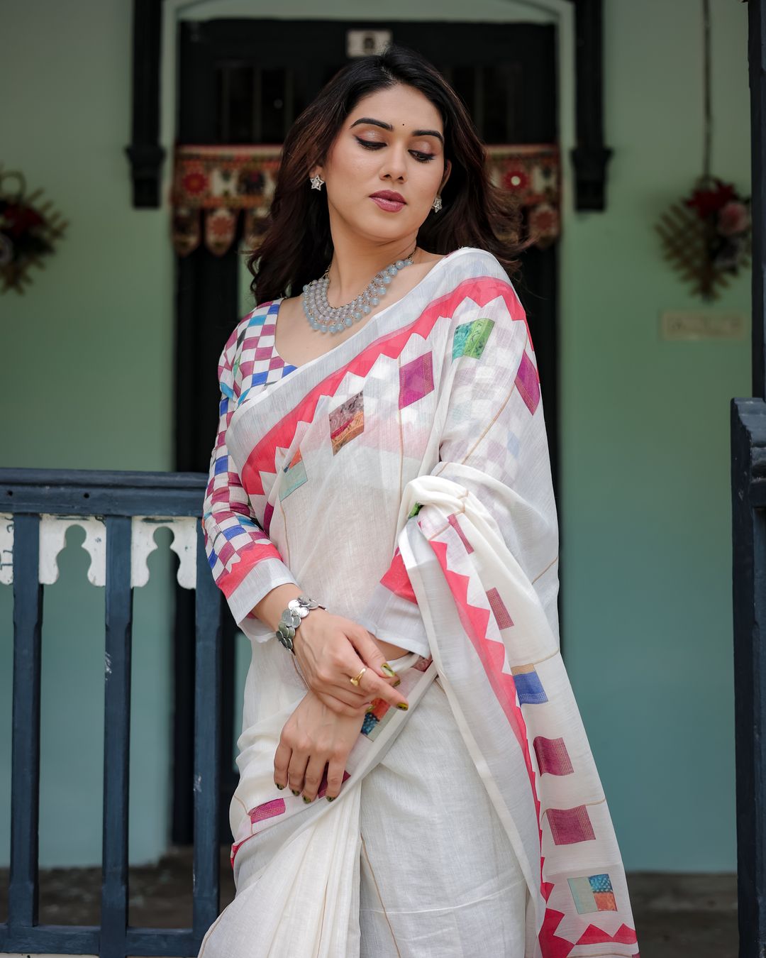Ivory Linen Cotton Saree with Multicolor Woven Border