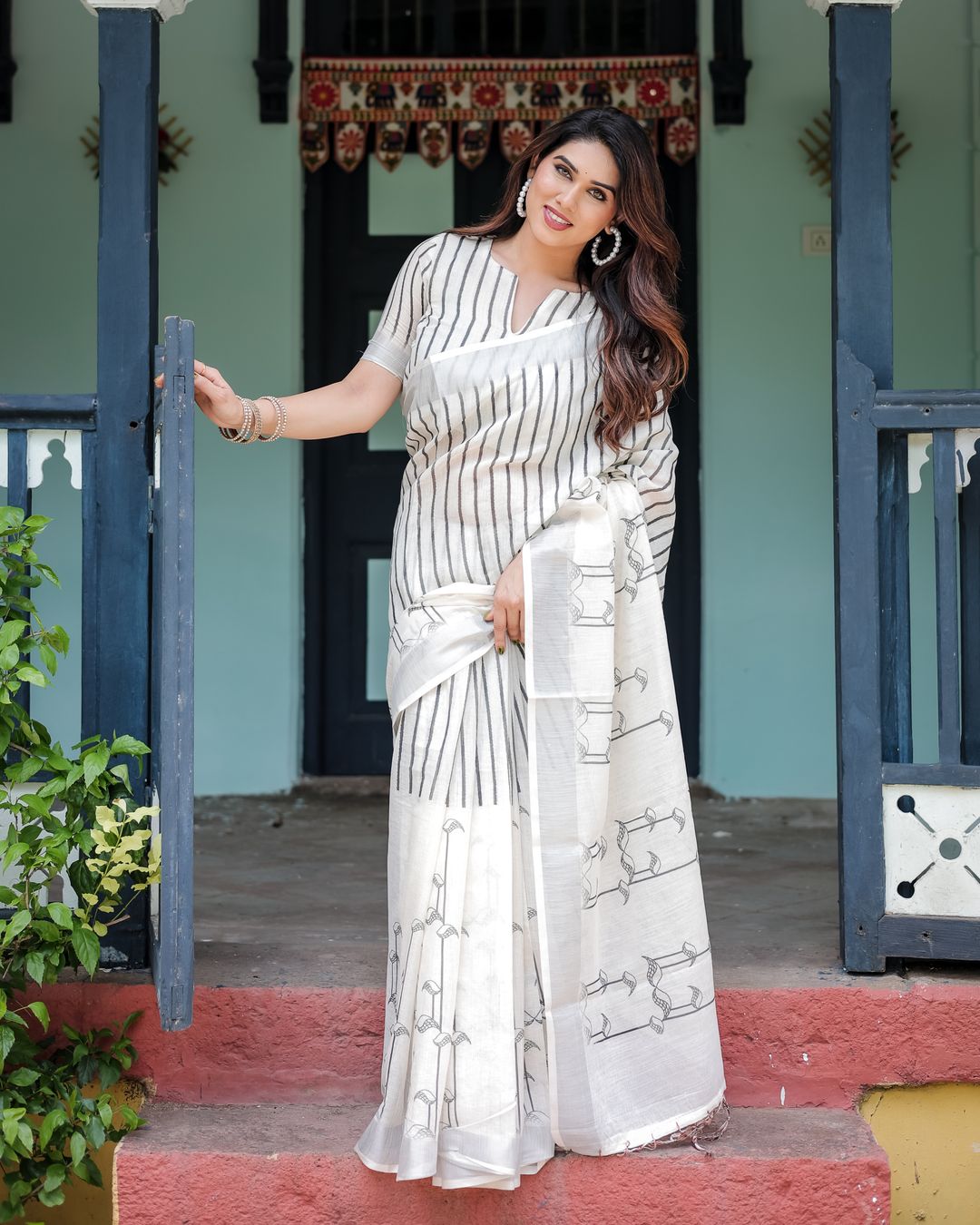 Ivory Linen Cotton Saree with Black Stripe Motif Design