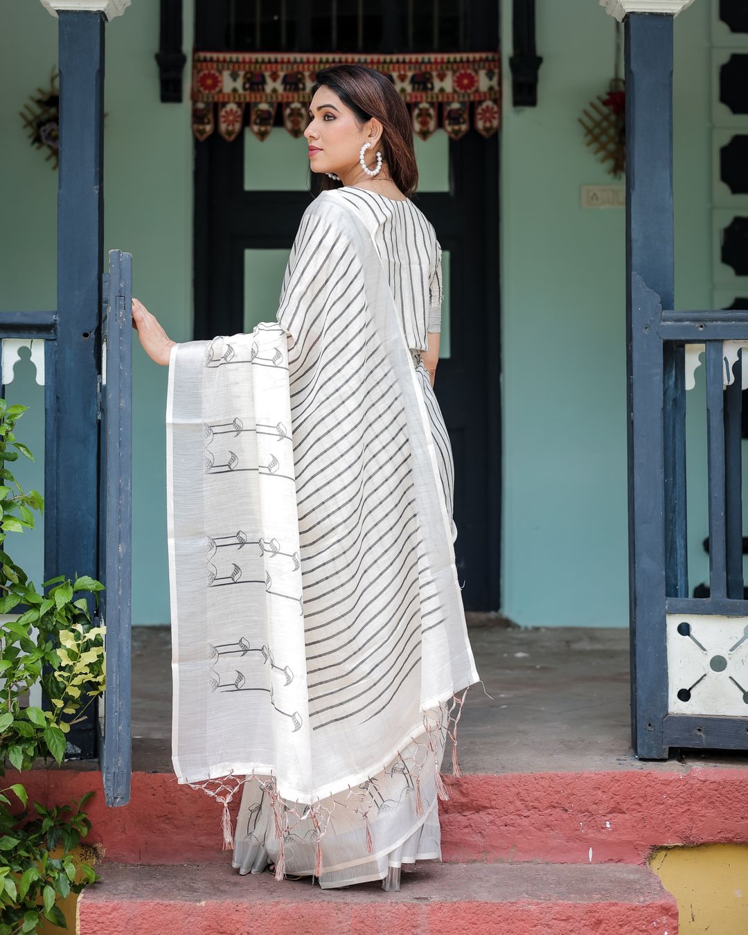Ivory Linen Cotton Saree with Black Stripe Motif Design