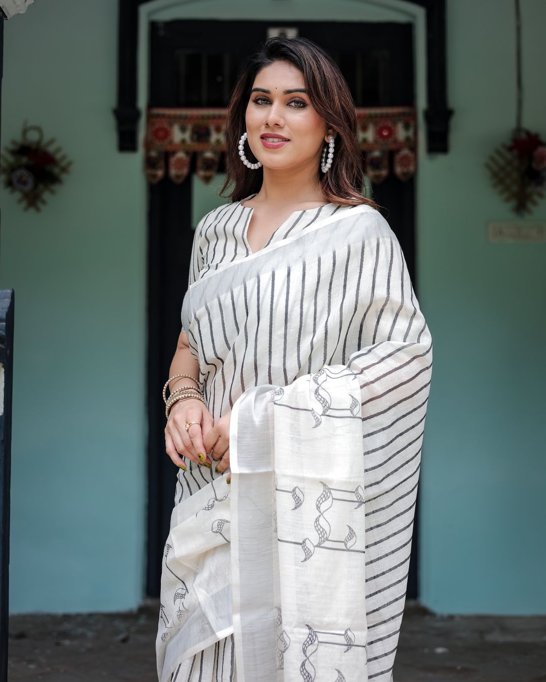 Ivory Linen Cotton Saree with Black Stripe Motif Design