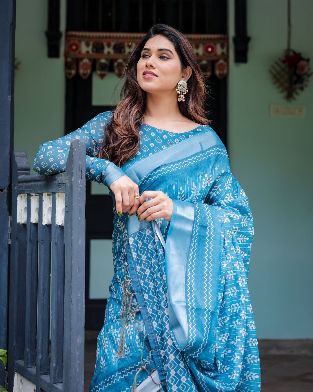 Blue Floral Linen Cotton Saree With Woven Border Design