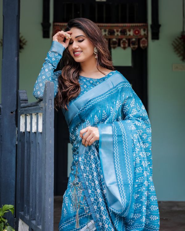 Blue Floral Linen Cotton Saree With Woven Border Design