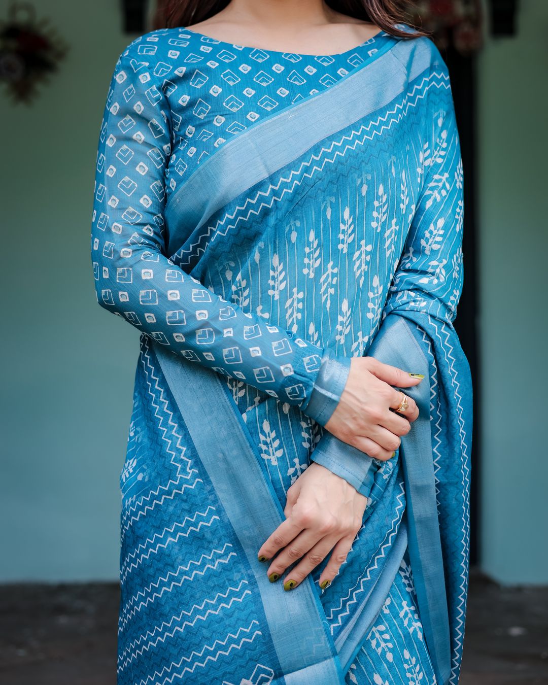 Blue Floral Linen Cotton Saree With Woven Border Design
