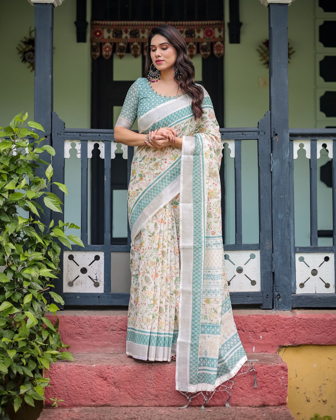 Ivory Floral Linen Cotton Saree With Teal Border Design
