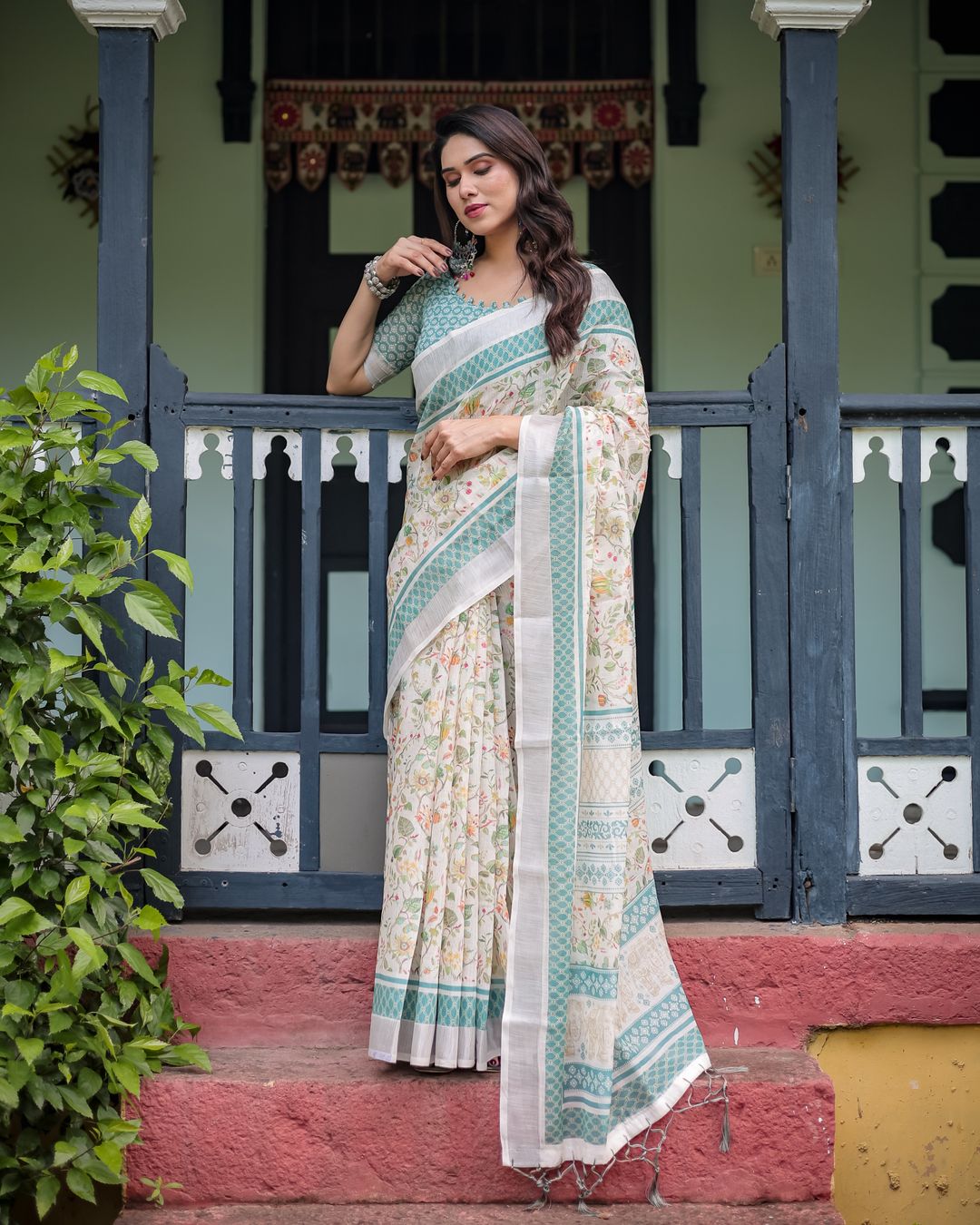 Ivory Floral Linen Cotton Saree With Teal Border Design