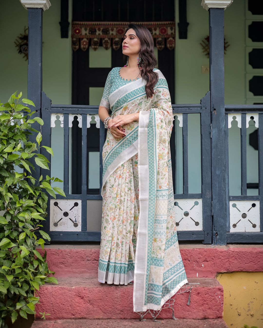 Ivory Floral Linen Cotton Saree With Teal Border Design