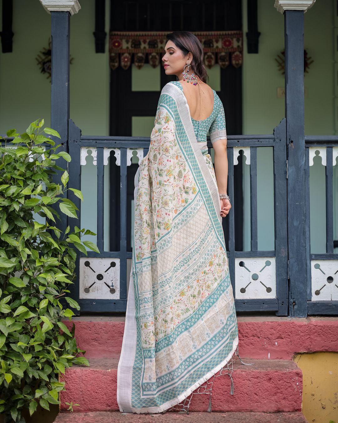 Ivory Floral Linen Cotton Saree With Teal Border Design