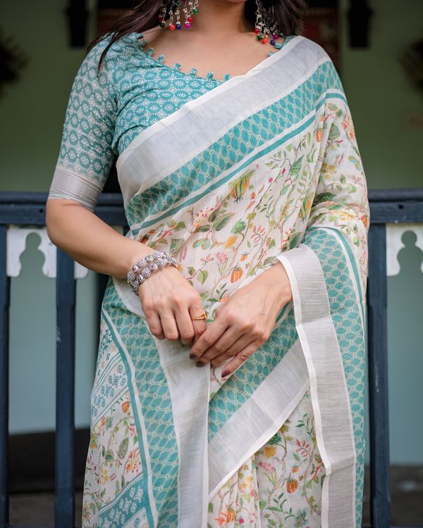 Ivory Floral Linen Cotton Saree With Teal Border Design