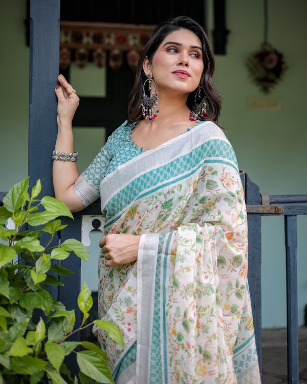 Ivory Floral Linen Cotton Saree With Teal Border Design