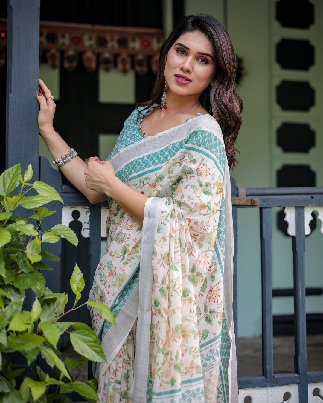 Ivory Floral Linen Cotton Saree With Teal Border Design