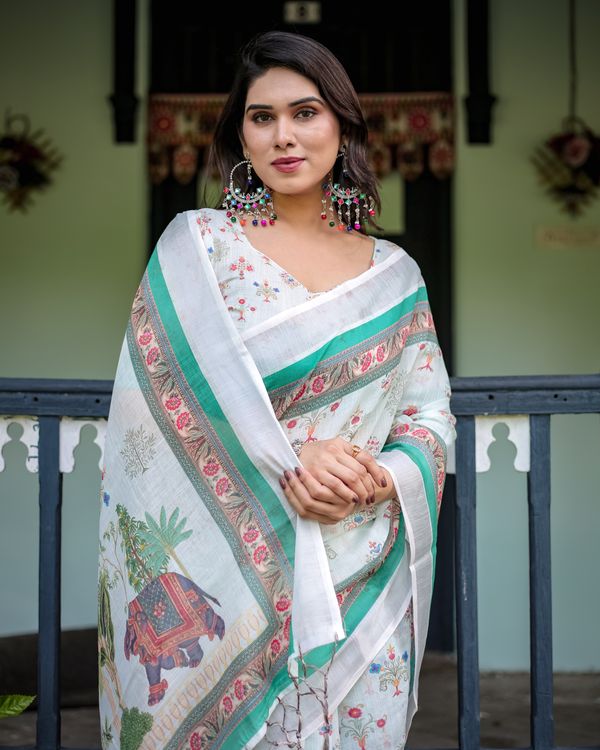 Ivory Floral Linen Cotton Saree With Teal Border Design