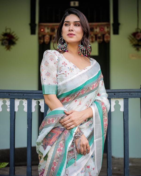 Ivory Floral Linen Cotton Saree With Teal Border Design