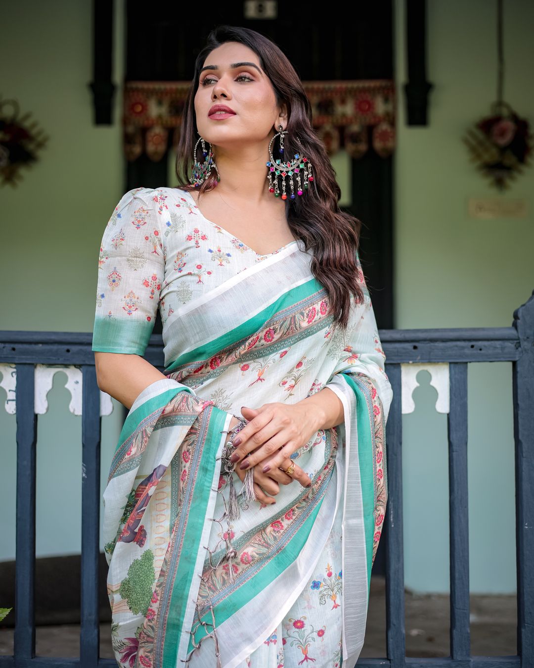 Ivory Floral Linen Cotton Saree With Teal Border Design