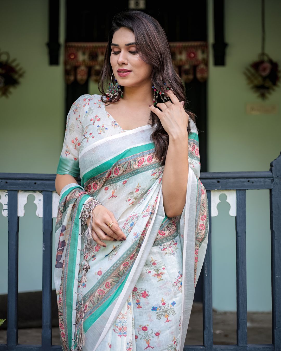 Ivory Floral Linen Cotton Saree With Teal Border Design