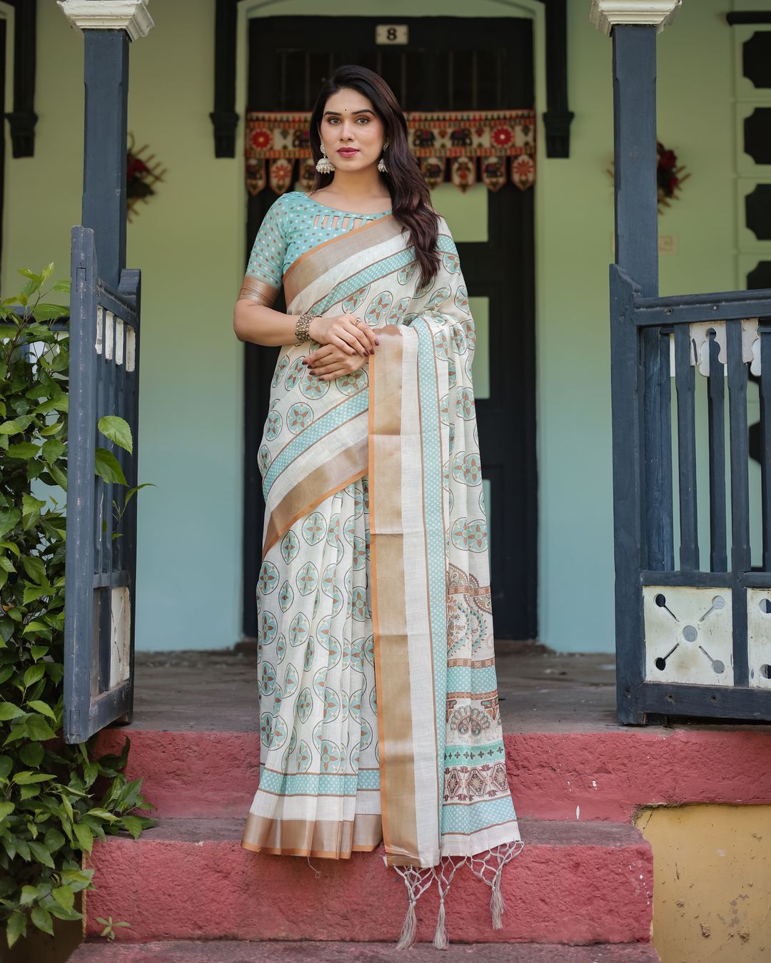 Ivory Linen Cotton Saree with Teal Floral Motifs