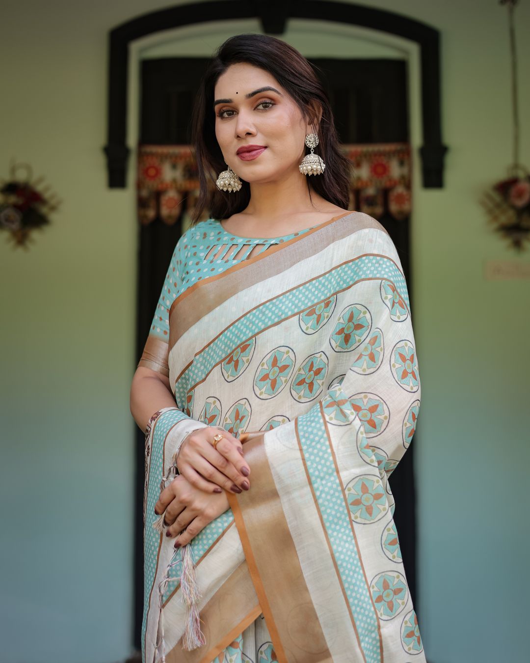 Ivory Linen Cotton Saree with Teal Floral Motifs