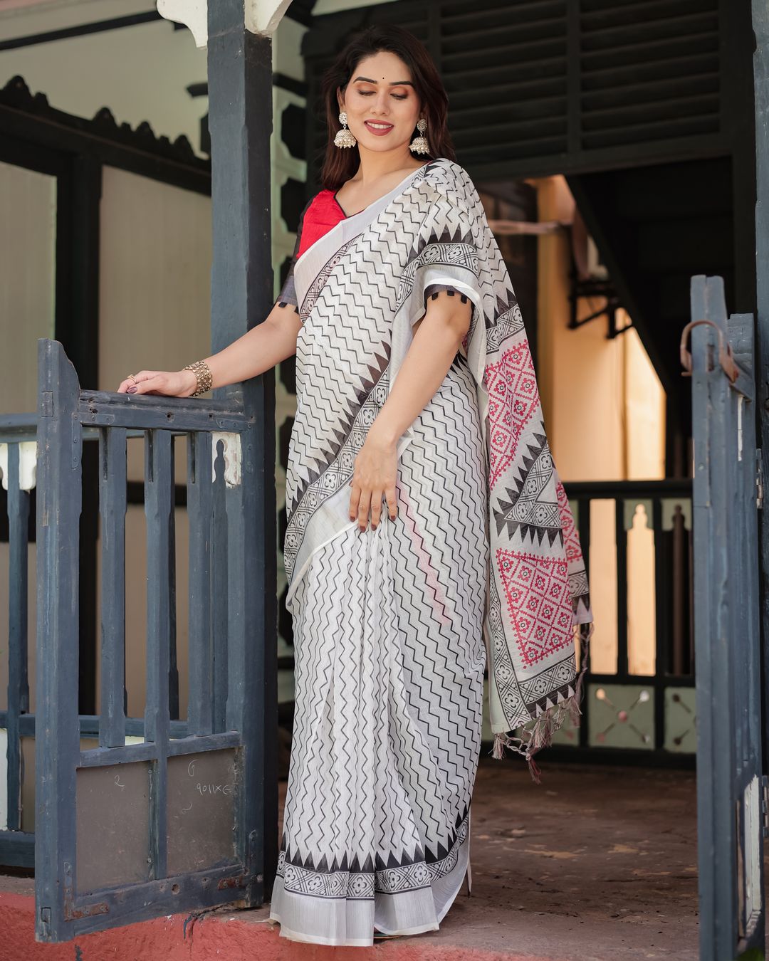 Ivory Linen Cotton Saree with Black Pink Tribal Pattern