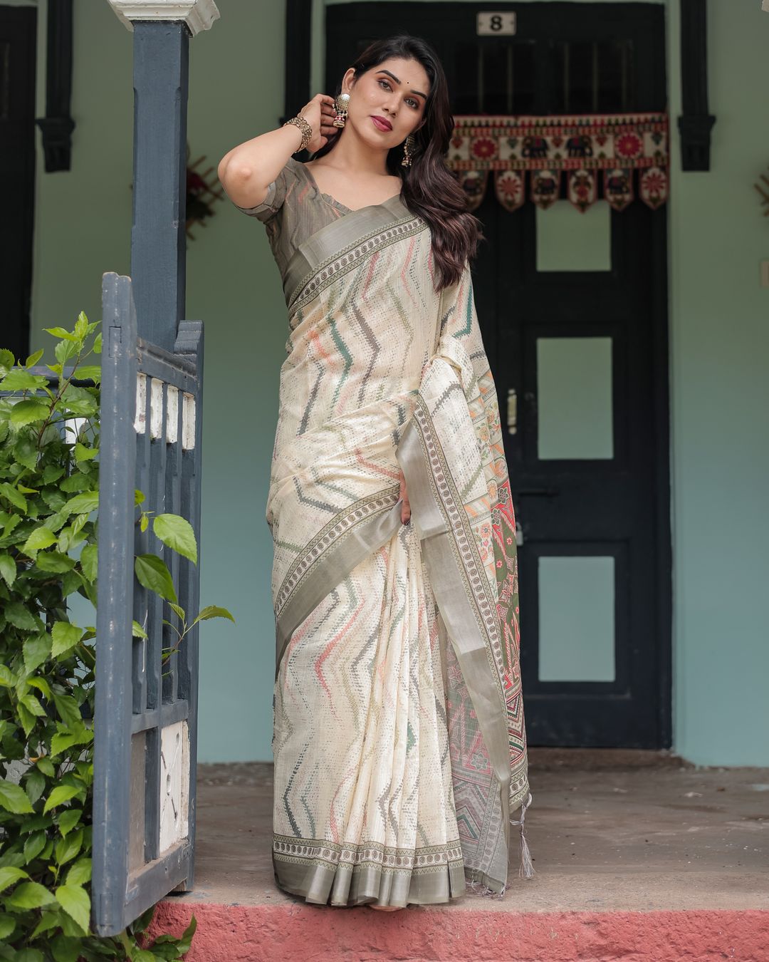 Ivory Linen Cotton Saree with Tribal Print Border and Pallu