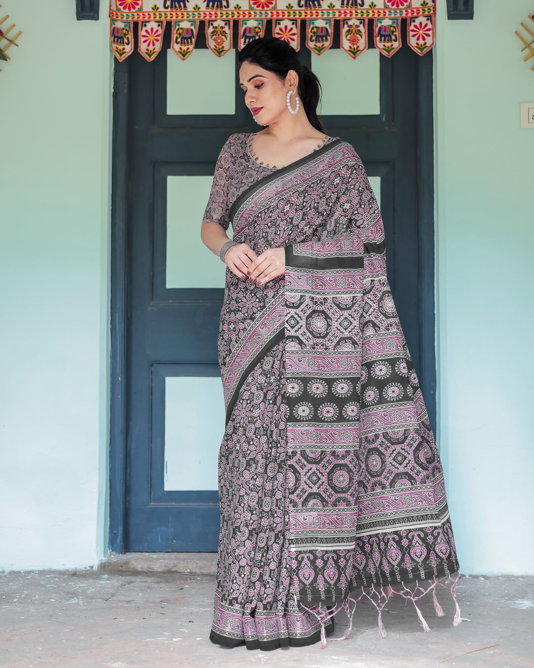 Black Pink Linen Cotton Saree with Floral Motifs and Tassel