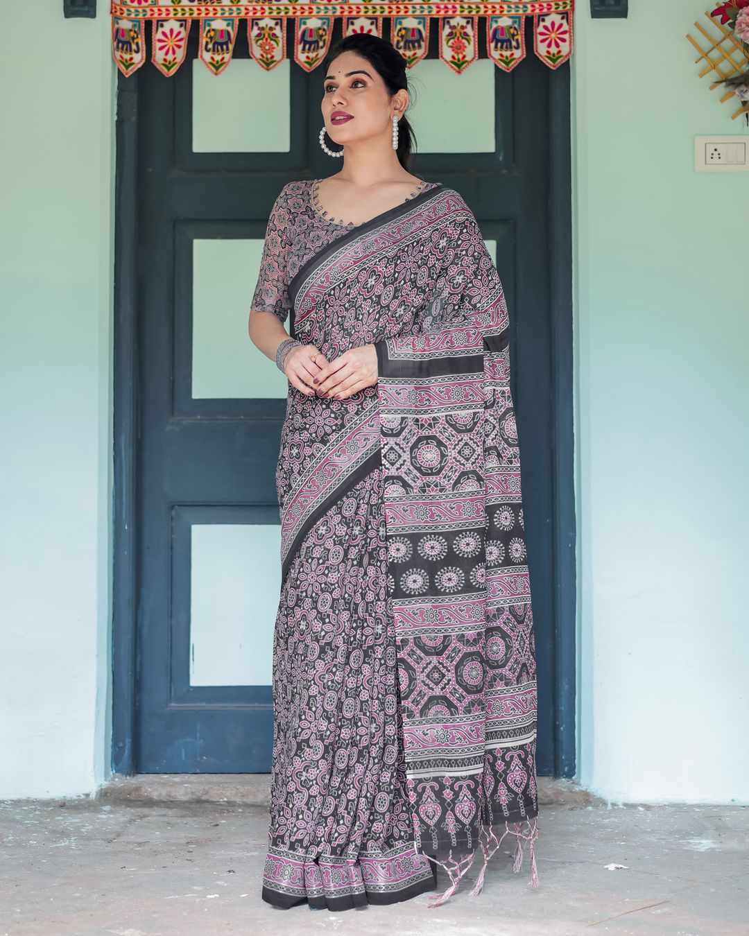 Black Pink Linen Cotton Saree with Floral Motifs and Tassel