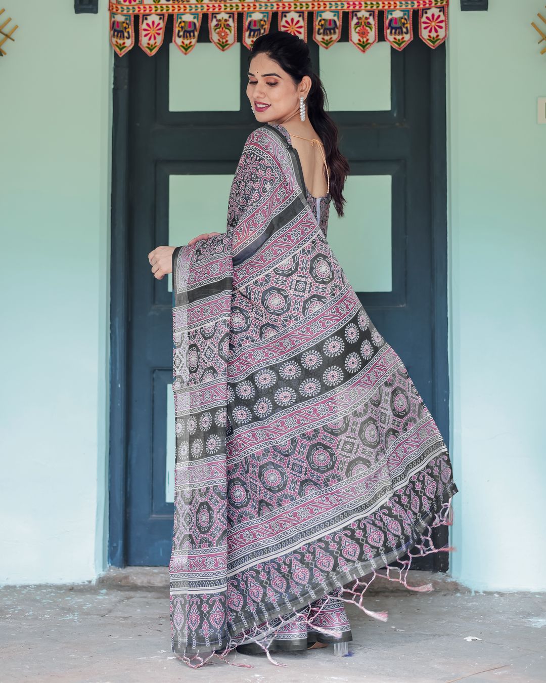 Black Pink Linen Cotton Saree with Floral Motifs and Tassel