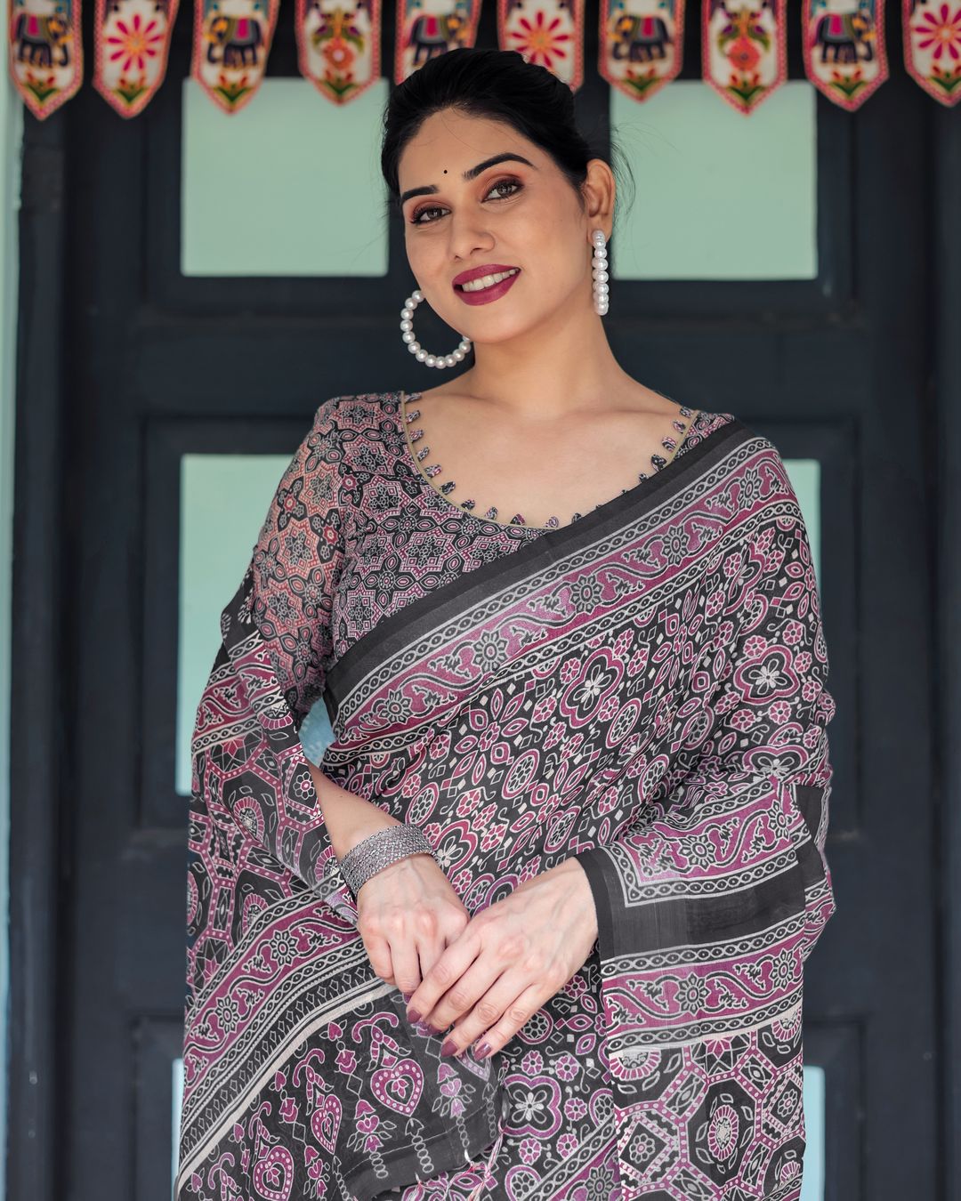 Black Pink Linen Cotton Saree with Floral Motifs and Tassel