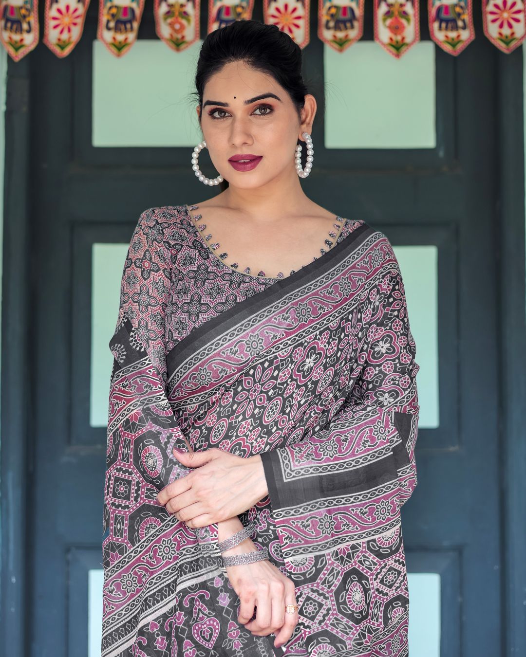 Black Pink Linen Cotton Saree with Floral Motifs and Tassel