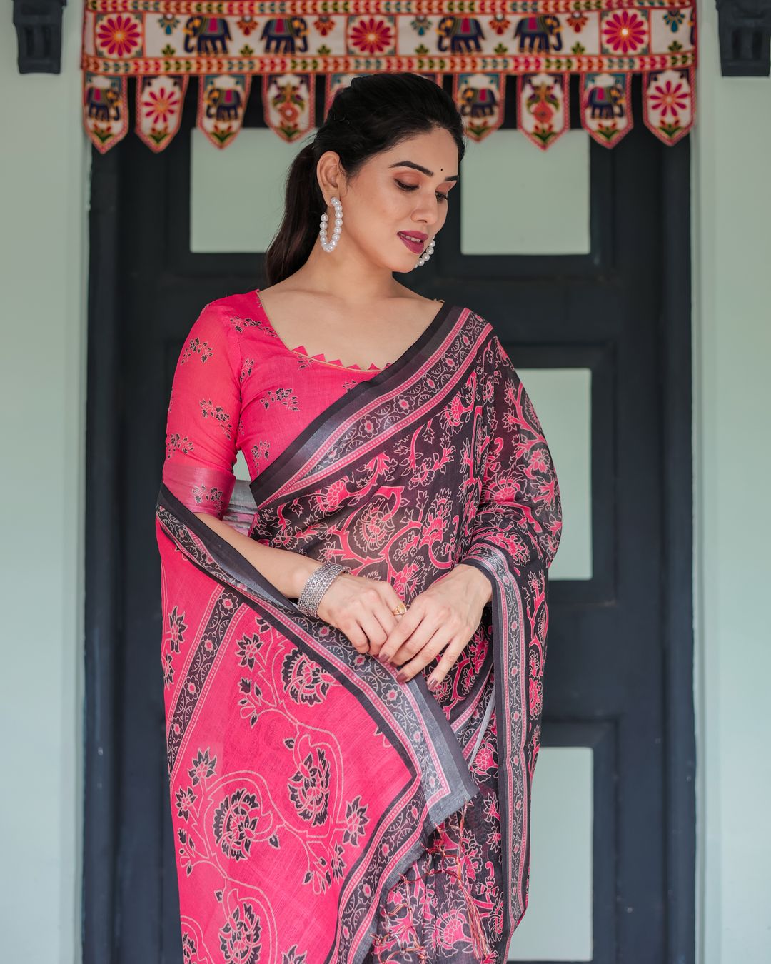 Hot Pink Black Floral Linen Cotton Saree with Tassel Edges