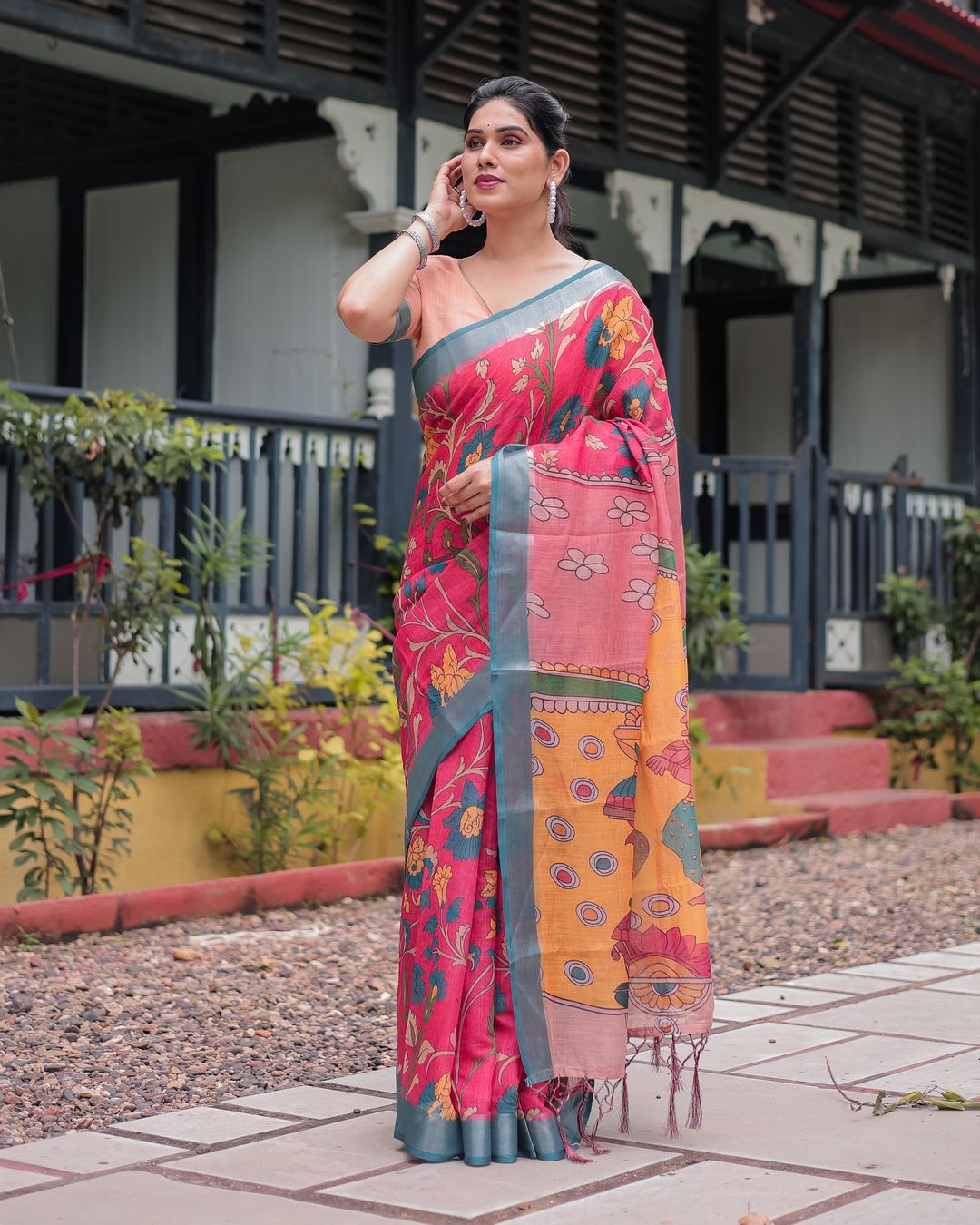Coral Pink Linen Cotton Saree with Teal Edge & Tassel Pallu
