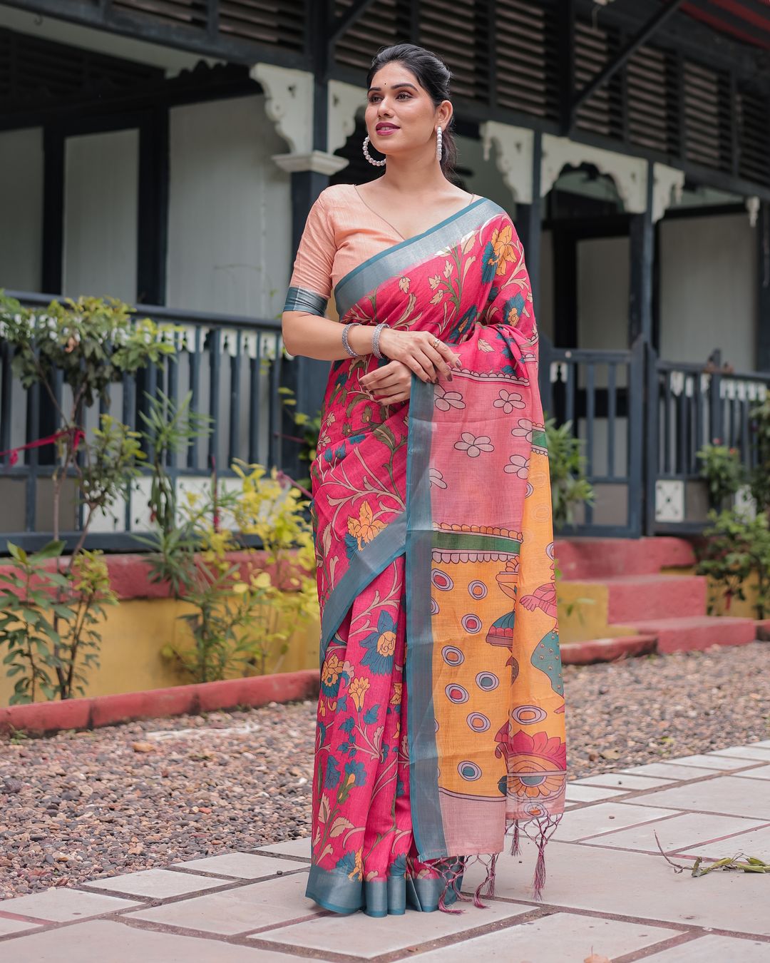 Coral Pink Linen Cotton Saree with Teal Edge & Tassel Pallu