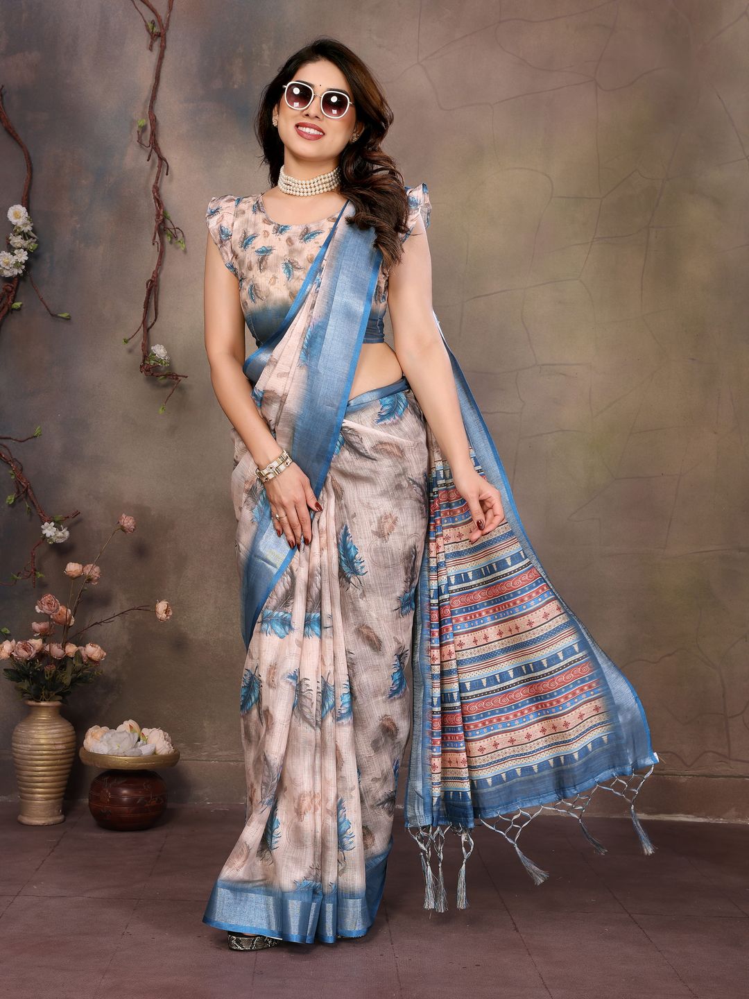 Cream Cotton Linen Saree with Blue Feather Print and Designer Border
