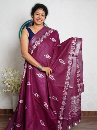 Wine Purple Saree with White Floral Motifs and Pink Border