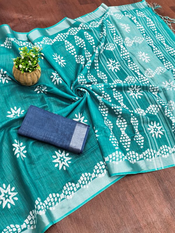 Turquoise Saree with White Floral Motifs and Geometric Border