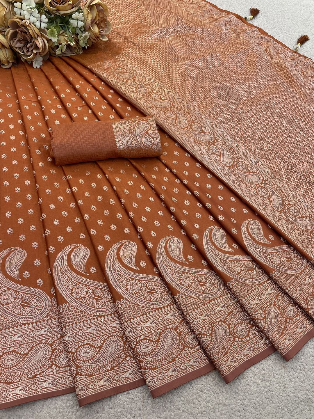 Varnavi Rust Orange Satin Silk Saree with Golden Zari Paisley Border
