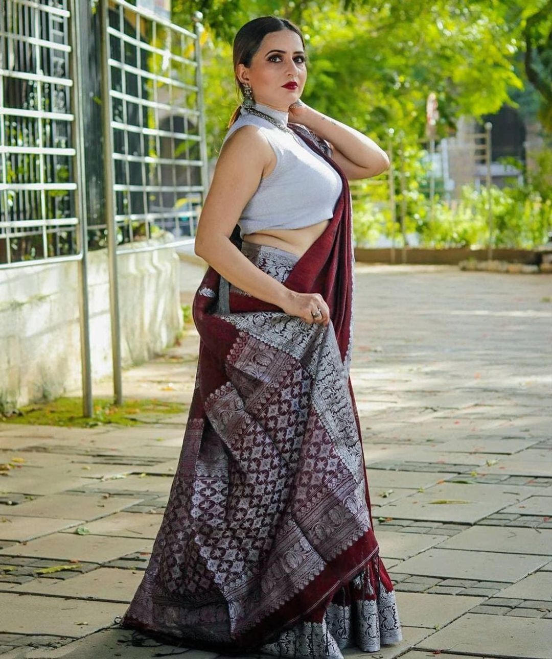 Varnavi Maroon Banarasi Soft Silk Saree with Silver Floral Border