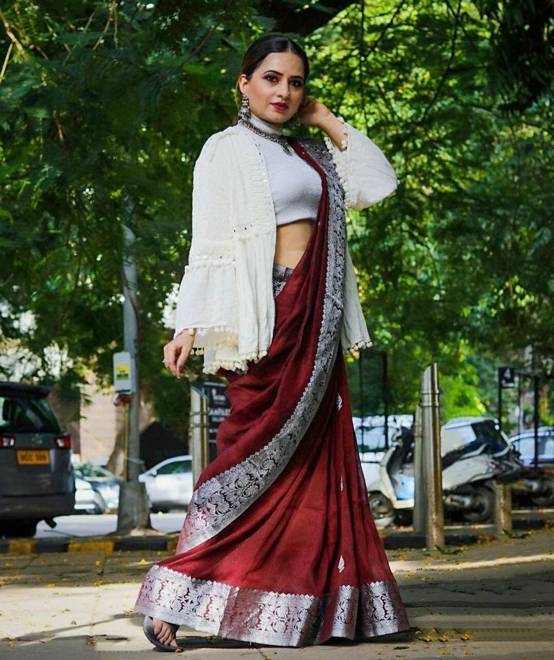 Varnavi Maroon Banarasi Soft Silk Saree with Silver Floral Border