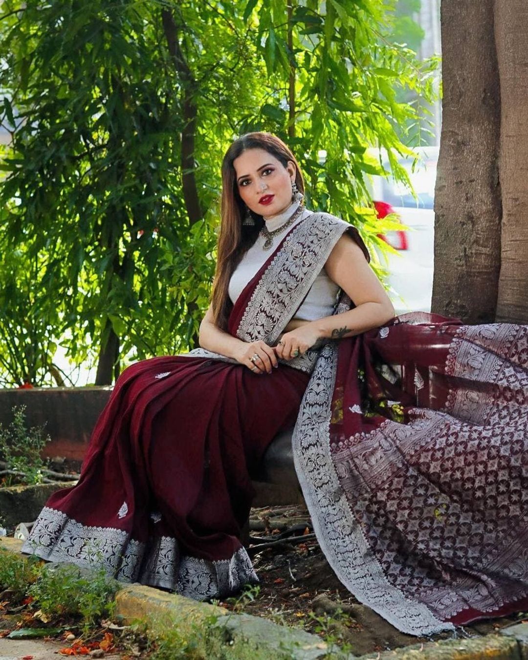 Varnavi Maroon Banarasi Soft Silk Saree with Silver Floral Border