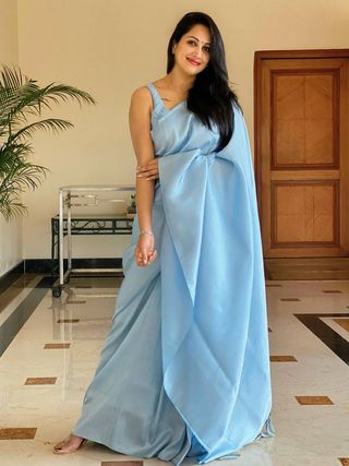 Sky Blue Soft Silk Saree with Elegant Plain Drape and Tassel Border