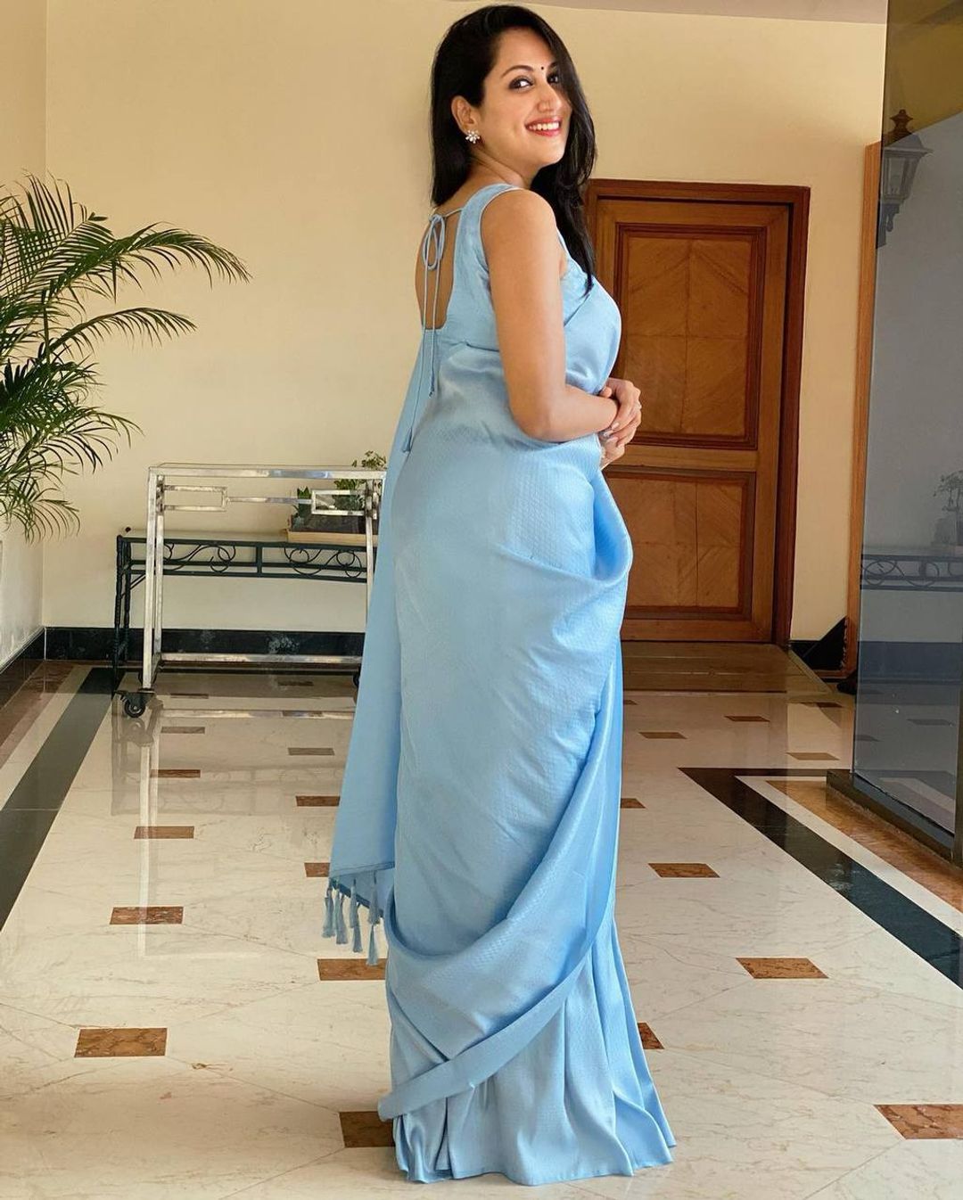 Sky Blue Soft Silk Saree with Elegant Plain Drape and Tassel Border