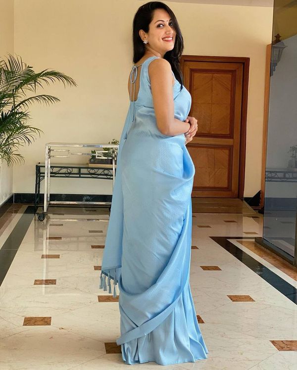Sky Blue Soft Silk Saree with Elegant Plain Drape and Tassel Border