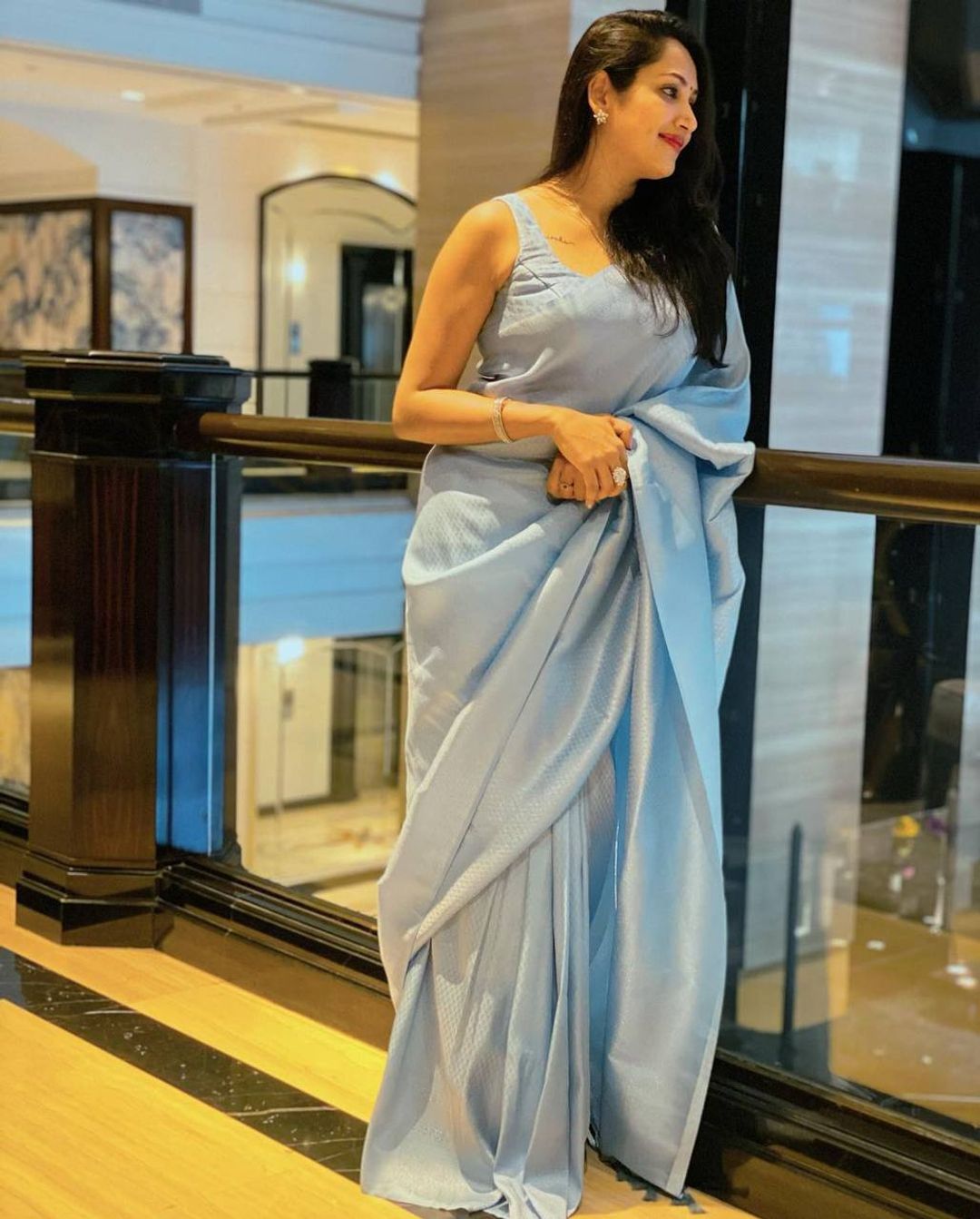Sky Blue Soft Silk Saree with Elegant Plain Drape and Tassel Border