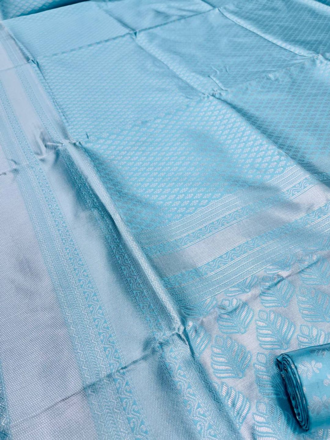 Sky Blue Soft Silk Saree with Elegant Plain Drape and Tassel Border