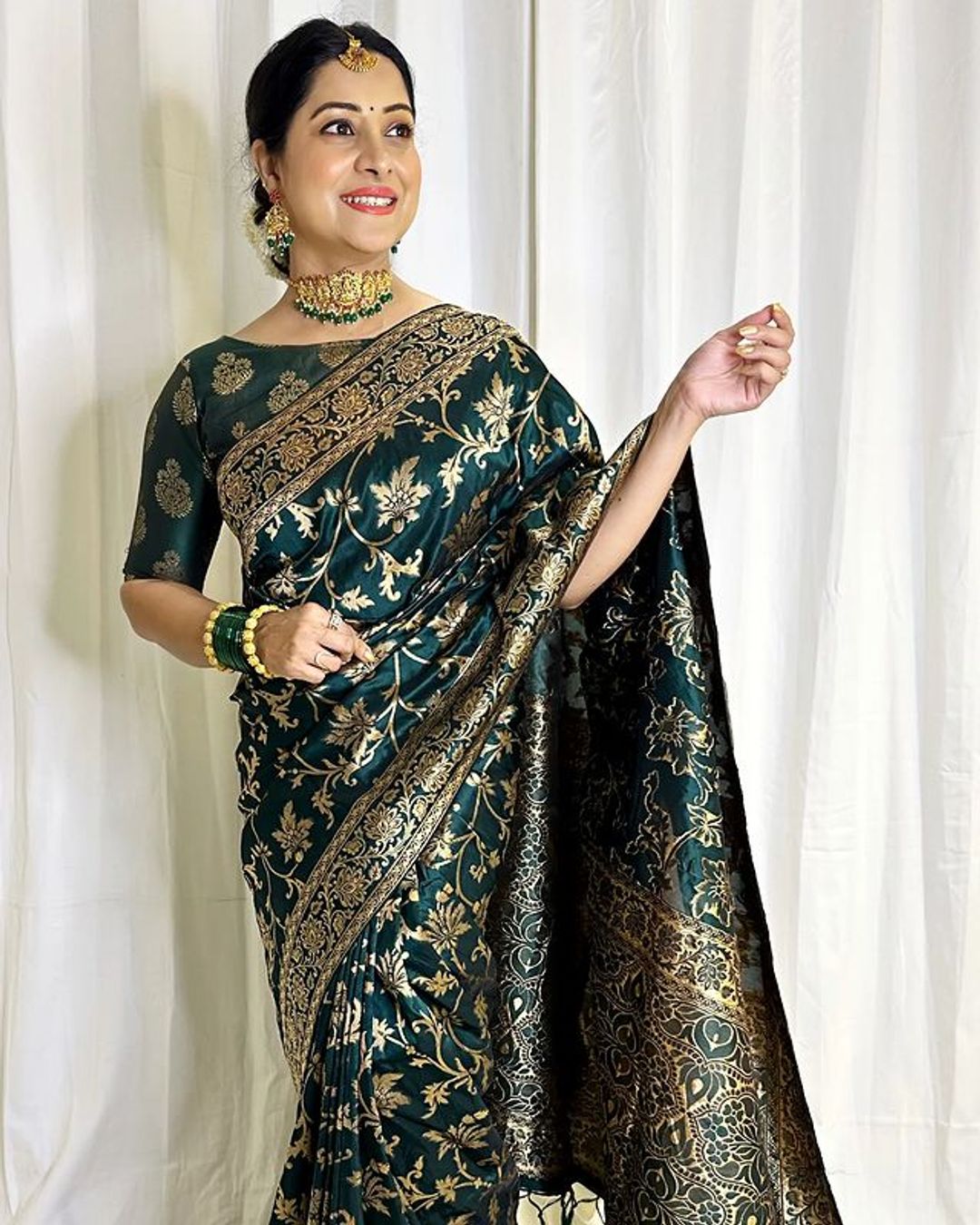 Varnavi Dark Green Banarasi Soft Silk Saree with Golden Floral Zari
