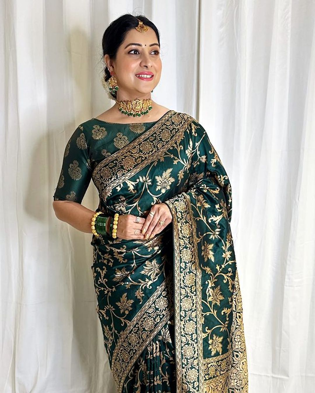 Varnavi Dark Green Banarasi Soft Silk Saree with Golden Floral Zari