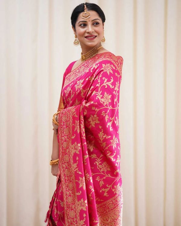 Varnavi Rani Pink Banarasi Soft Silk Saree with Golden Floral Weaving