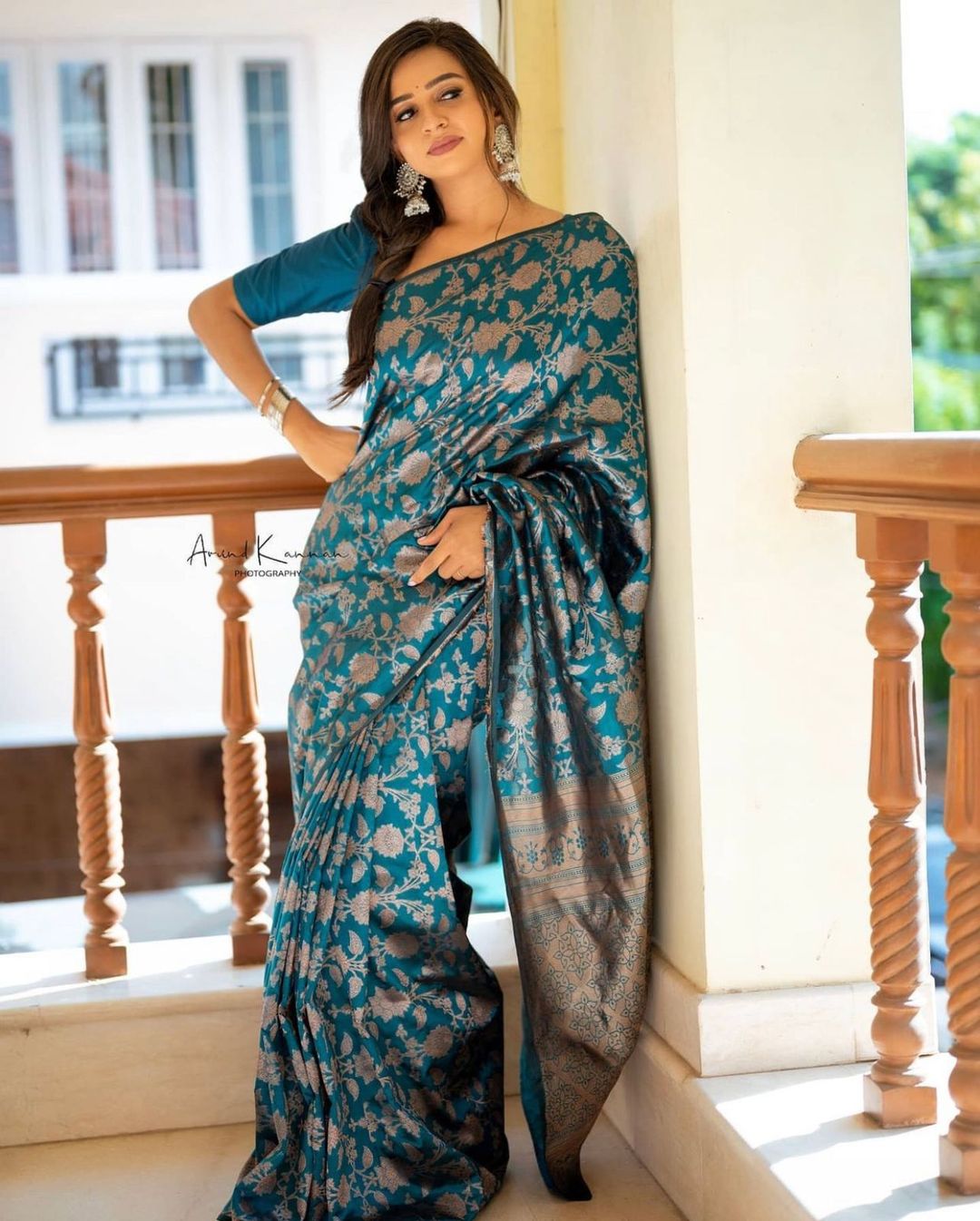 Teal Blue Banarasi Soft Silk Saree with Floral Motifs