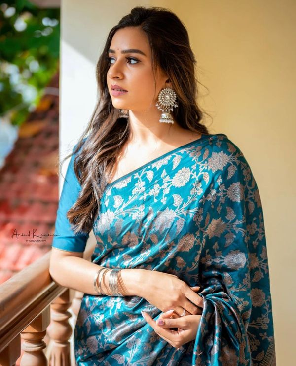 Teal Blue Banarasi Soft Silk Saree with Floral Motifs