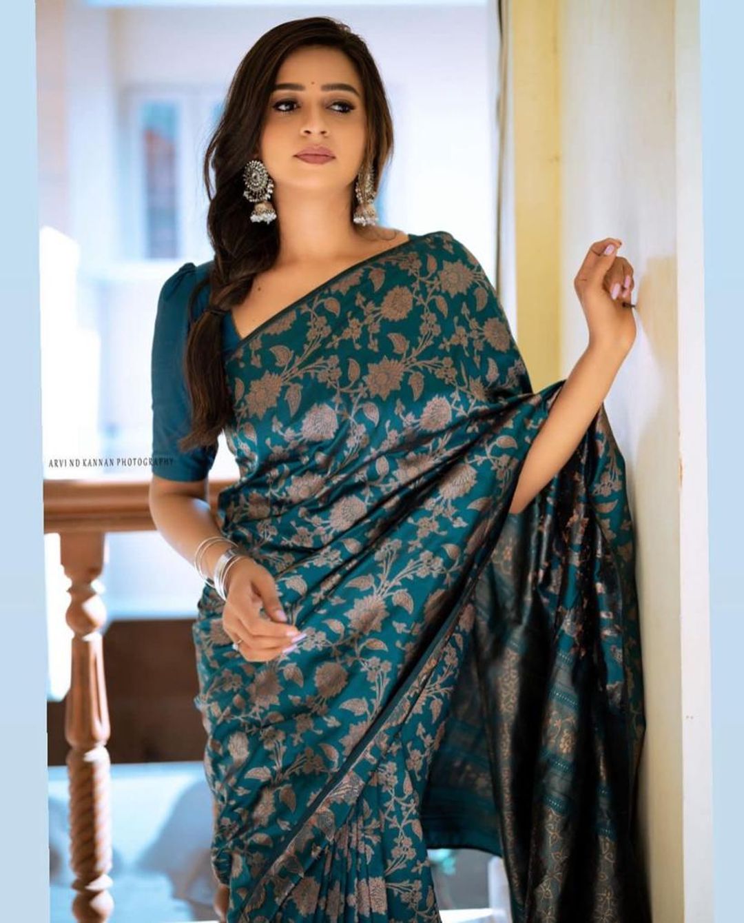 Teal Blue Banarasi Soft Silk Saree with Floral Motifs